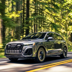 Audi Q7 Outdoors driving through the forrest